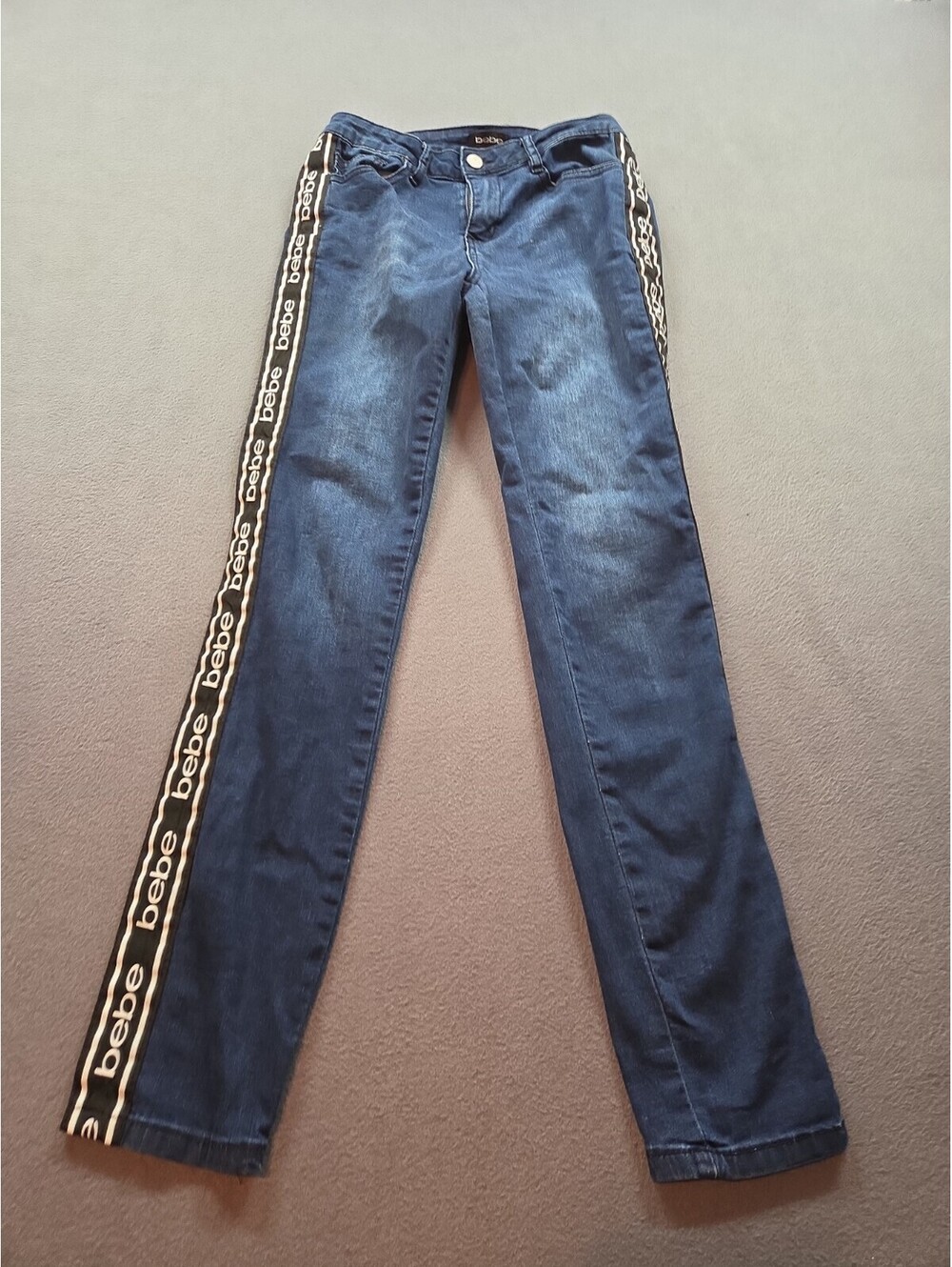 women's blue denim jeans by Bebe size 26×30